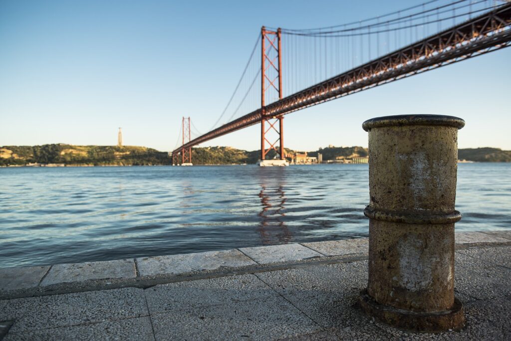 Bridge over water, with a bollard in the foreground